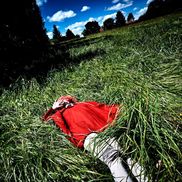 girl with red coat in the grass by Steve Hiett | SPOON Magazine